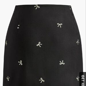 Elegant Black Skirt with White Bow Accents